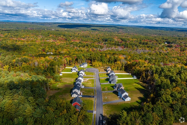 Quiet neighborhoods surrounded by trees are common in Uxbridge.