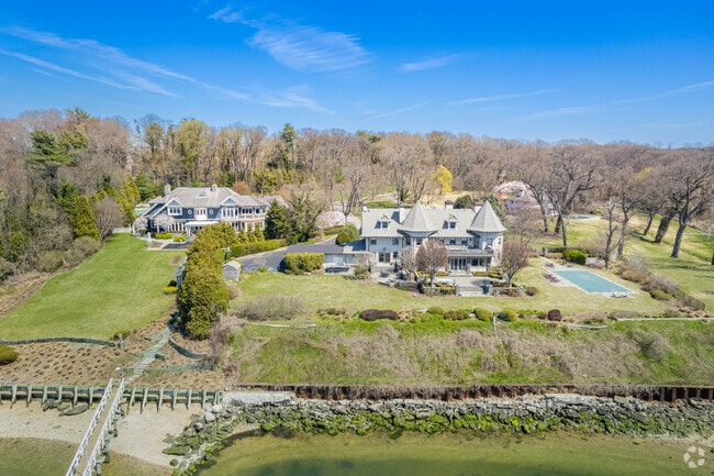 Some estates in Sands Point have beautiful sunset views over the New York City skyline.