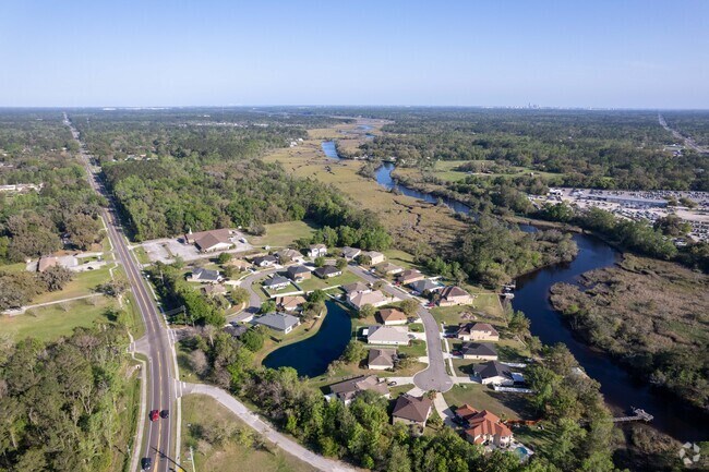The Forest Trails neighborhood is surrounded by lush greenery.