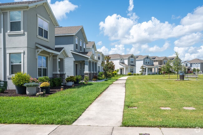 A row of houses overlooks one of the many green spaces in the Storey Park neighborhood.