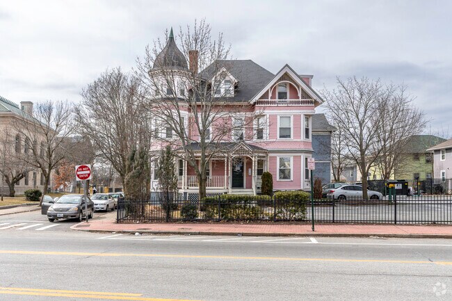 Elmwood Avenue homes sit near shops, parks, and bus routes in Providence.