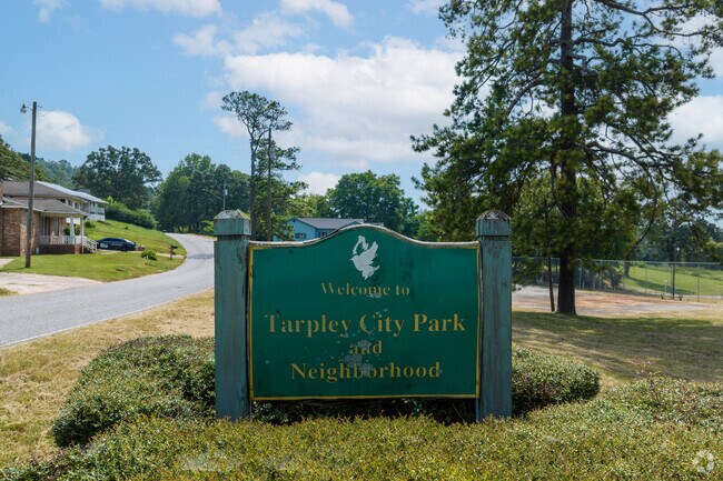 Tarpley City Park features a playground, basketball court, and picnic tables.