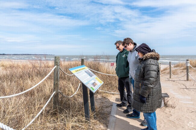 Informational signage about the dunes and stormwater runoff inform visitors at North Beach Park.