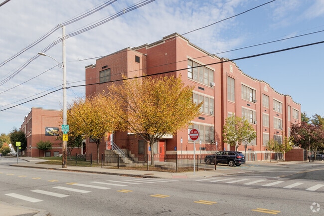 Veazie Street Elementary School in Wanskunk, RI takes up a block with its brick building.