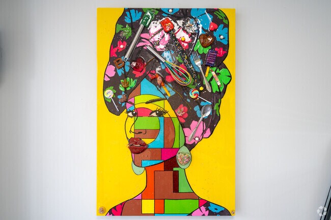 A colorful painting on the wall of Bird's Place in Civic Betterment.