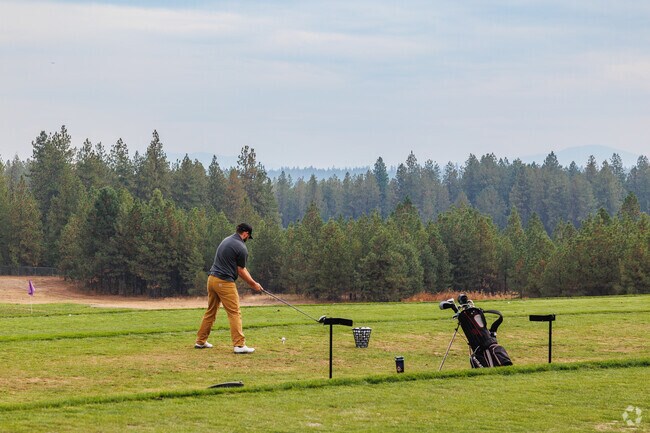 Practice your swing at on the driving range at The Highlands Golf Club in Post Falls East.