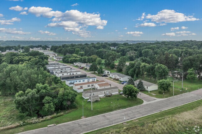 Norton Tract is a lush landscape of mature trees with older homes and manufactured housing.