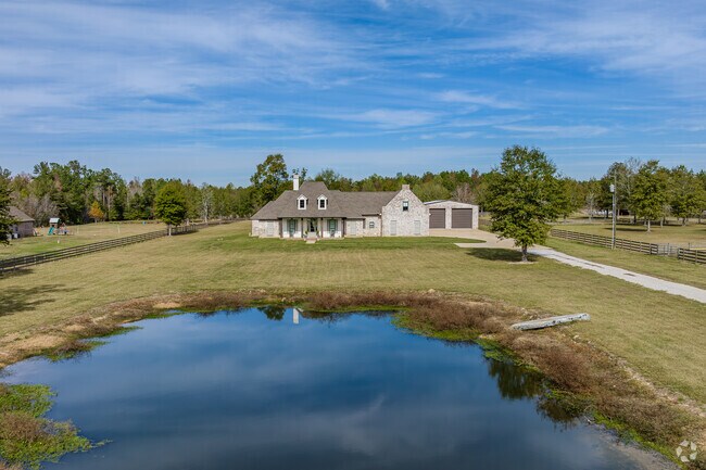 This larger newly built estate comes with it's own pond in Brownsfield/Central.