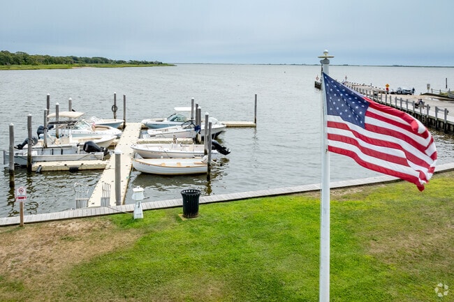 The American flag flies over East Quogue Marine Park, a local waterfront destination.