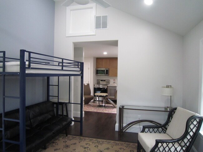 LR w/ Cathedral Ceiling & Ceiling Fan