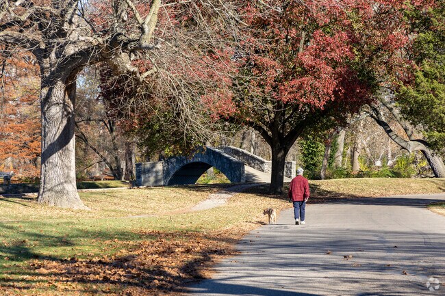Springfield residents bring their dogs for a peaceful walk at Eastwood Lake Park.