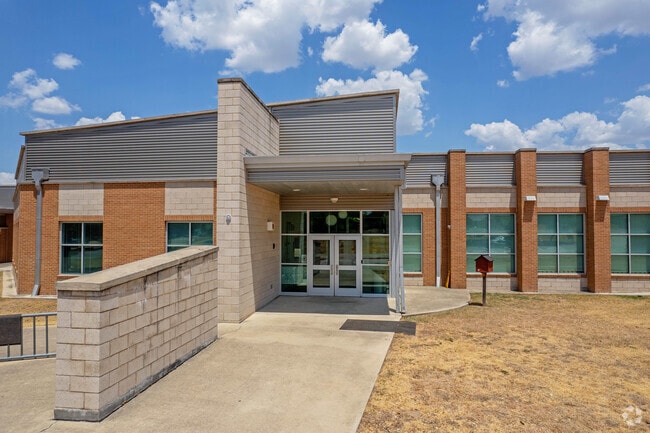 Many generations of children will walk through these doors.