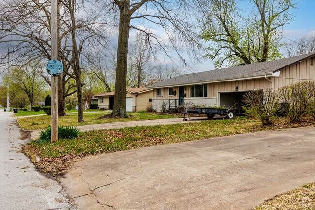 Residential streets in Parkcrest are lined with ranch homes.
