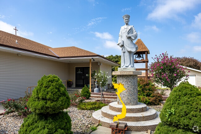 The gardent and statue are beautiful at St. Andrew Dung Lac Church in Cheney.