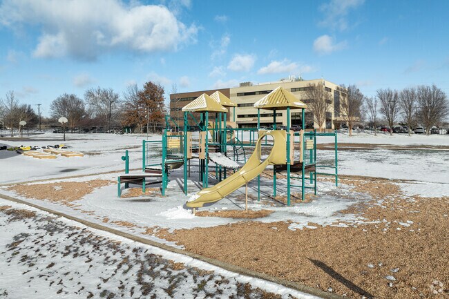 Kids can climb on the playground at All Saints Catholic Elementary School.
