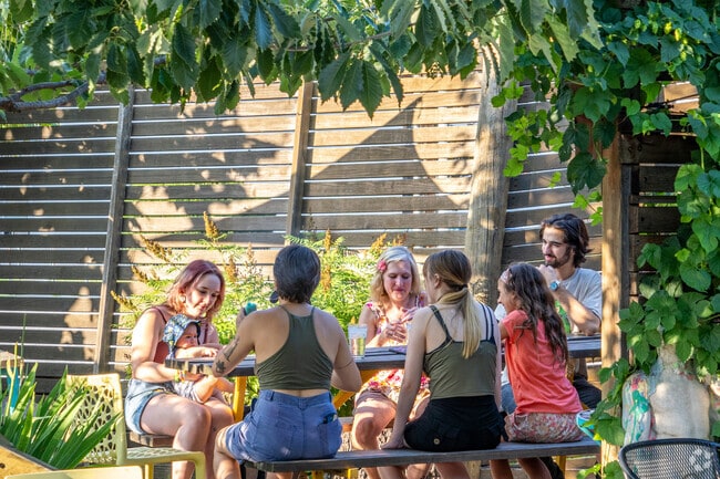 Residents enjoy wood fired pizza from Magoos Pizza in Saint Lawrence McAllister.