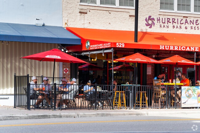 Unwind at Hurricane Alley's outdoor patio, soaking in the ambiance close to Arden Park.