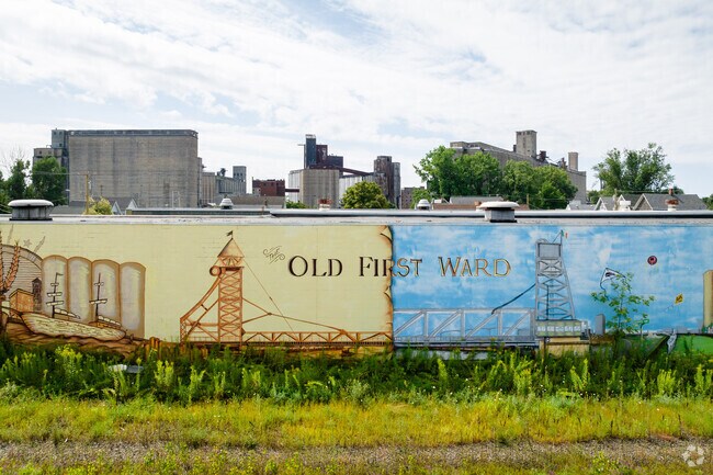 This mural reflects the industrial sites around it that make the charm of the First Ward.