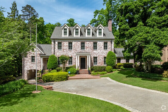 Large colonial estate homes are common throughout central Brookhaven.