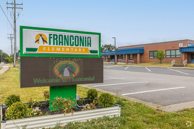 Sign entrance to Franconia Elementary school located in Alexandria, VA with a penguin mascot.