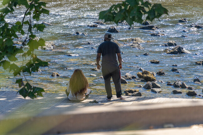 Residents can come and relax on the dock overlooking Flint River in Sherwood.