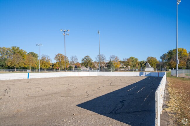 Evergreen Park features an ice rink, trails, a basketball court, and large open fields.