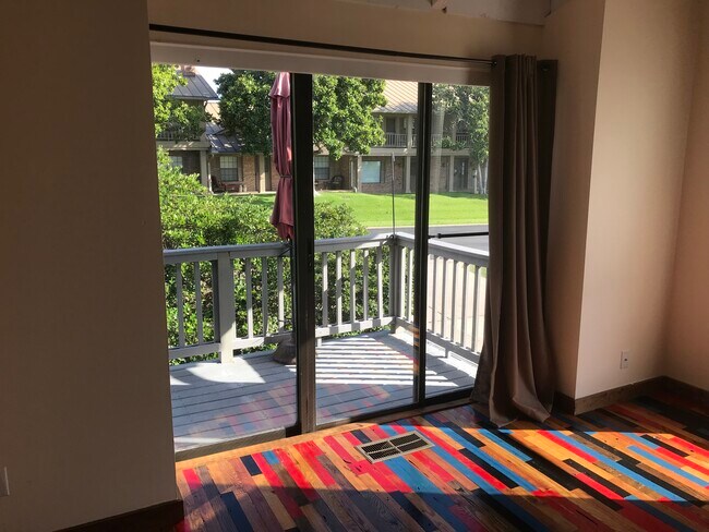 Living Room Opens to Balcony