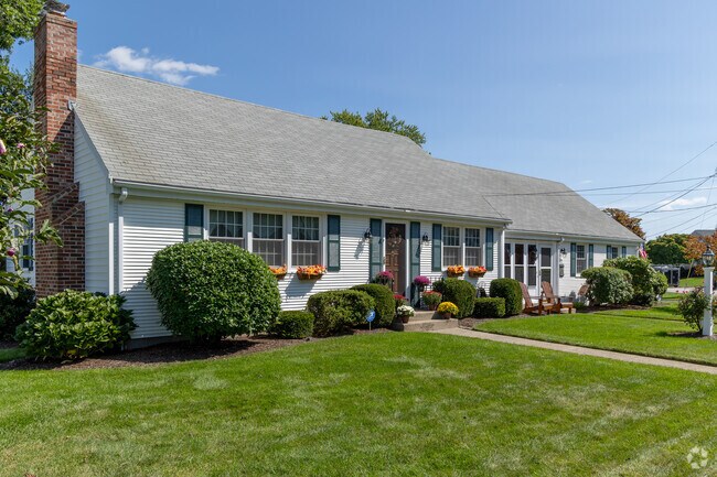 This ranch home in Kent Heights has seasonal decorations and a stylish yard.