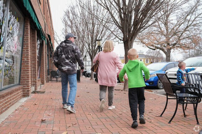 Families love to walk the sidewalks within the Glendale Village.