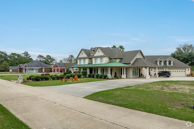 A row of newer homes sit along a quiet cul-de-sac in Winnie, Texas.