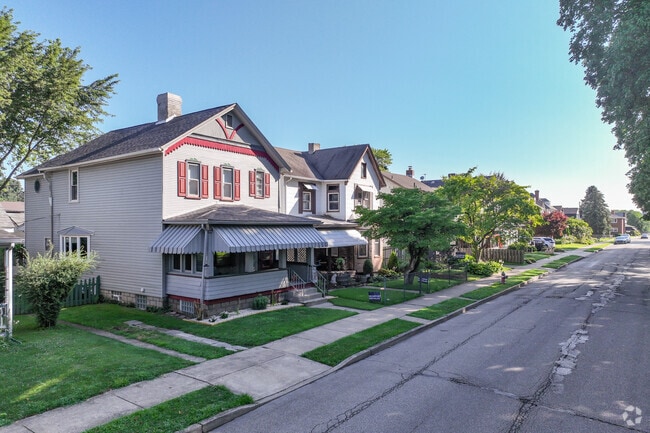 Some houses in Tarentum have a small front yard.