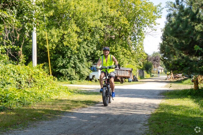Lumber River resident enjoys a bike ride at Wiouwash Trial.