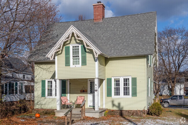 Gothic tracery in the gables of this downtown Conway home are an interesting adornment.