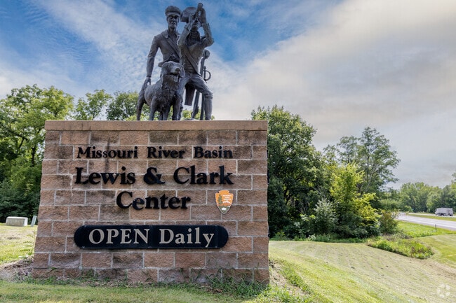 Explore rustic riverside trails near the Lewis & Clark Center.