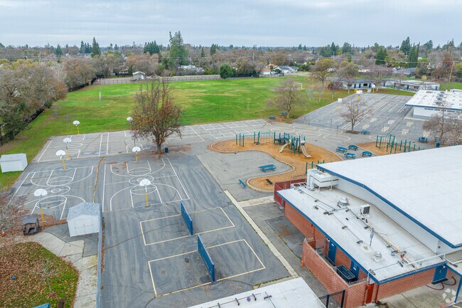 Play basketball at Skycrest Elementary School.