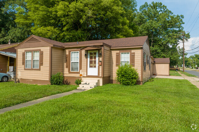 A beautiful traditional ranch style home sits peacefully on the corner in Queensborough.