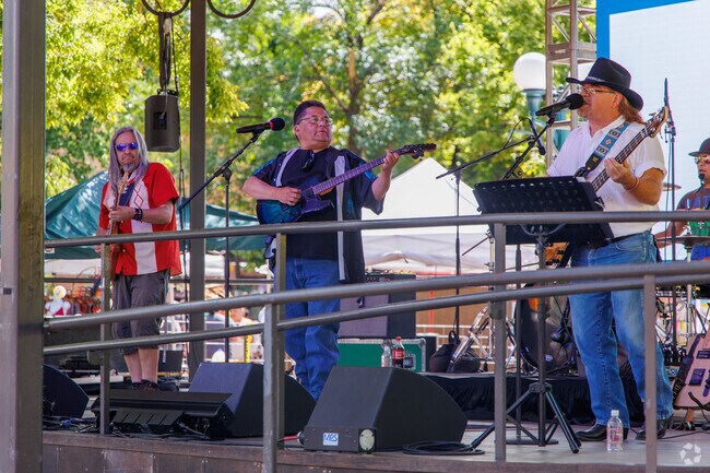 Live bands fill the plaza with great music at Fiesta de Santa Fe outside of Las Campanas.