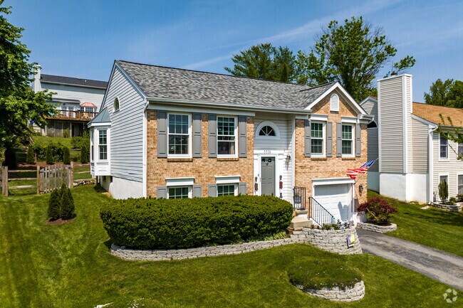 Well kept split level home located across the street from New Market West Park.