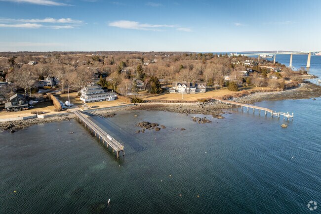 East Passage Estates offers stunning waterfront views overlooking the Bryer Point harbor.