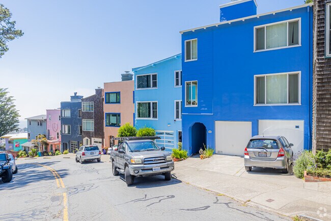 Larger colored stucco townhomes bring a vibrant flare to Golden Gate Heights.