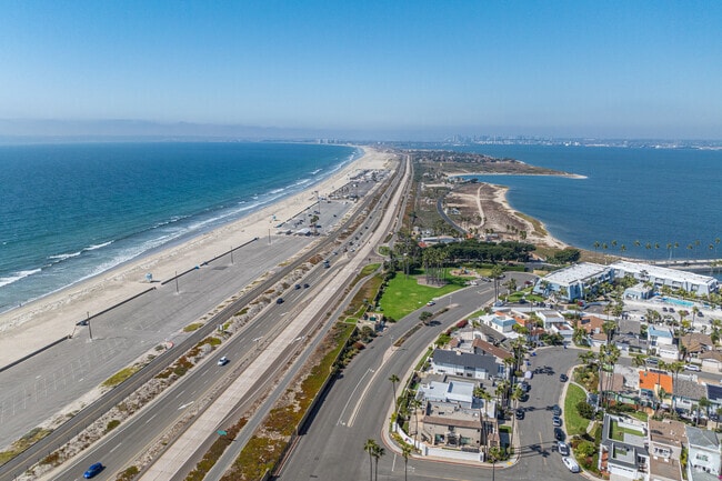 Coronado’s Silver Strand Beach offers stunning coastal views and sandy shores.