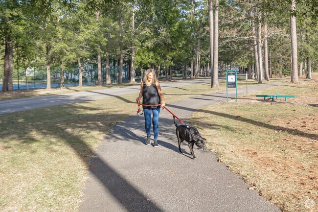 Wachesaw Plantation East has a great walking trail for residents to walk their dog.