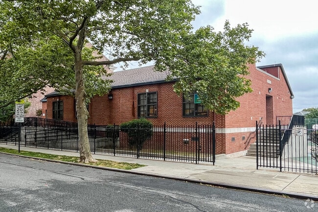 PS 113 has a separate building for children in lower grades.