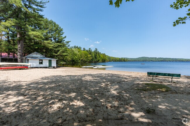 Crystal Lake Park’s public beach welcomes families for swimming and sun.
