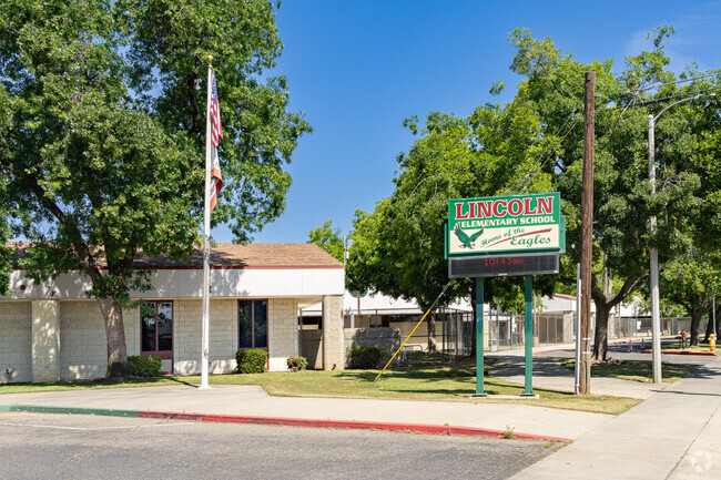 A lighted marquee outside the entrance to Lincoln Elementary School helps inform parents.
