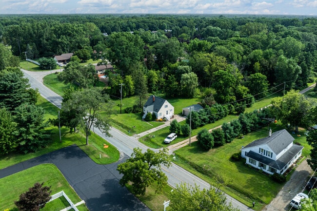 Homes in Flushing Township can sit on multiple acres with dense trees in the backyard.