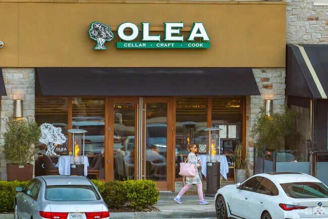 Olea in Newport Beach offers a refined dining experience with a West Coast-inspired menu, craft cocktails, and a warm, stylish ambiance perfect for any occasion.