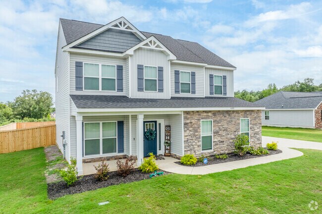 McBean is a community where winding backroads, green pastures, and access to Augusta combine seamlessly.