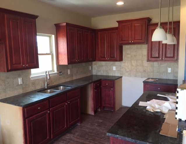 Upgrade kitchen with Cabernet Cherry wood cabinets. ( New pictures are coming with appliances!)