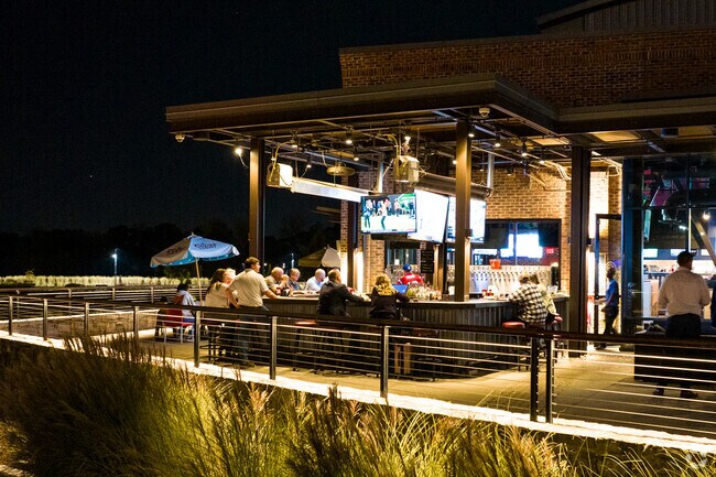 Baxter Village residents can watch the game in the outdoor bar at the Carolina Ale House.